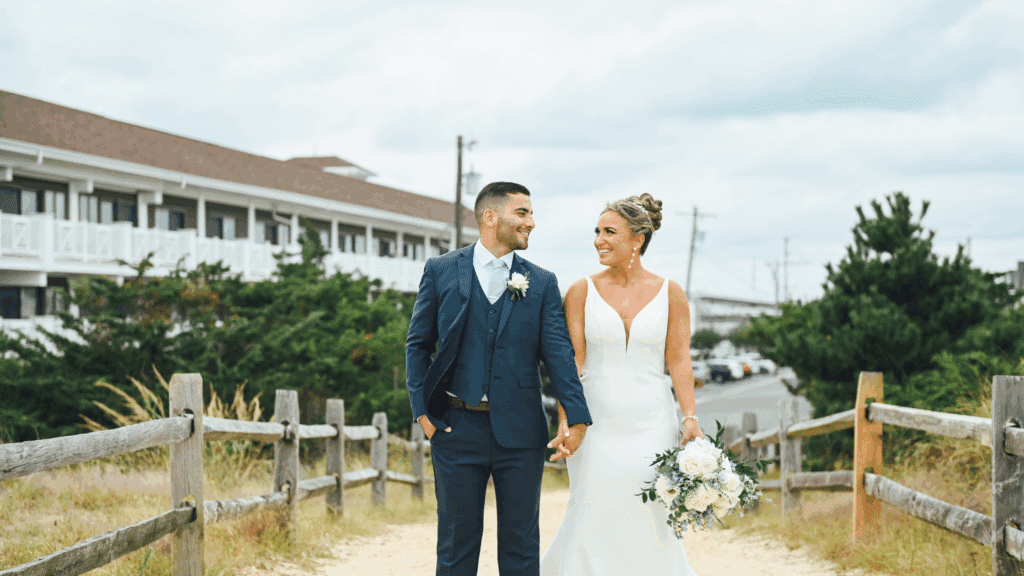 Bride and groom posing outside ICONA Avalon