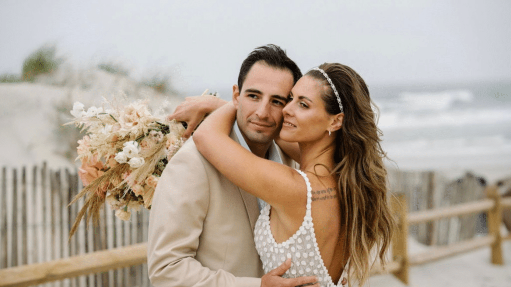 Bride and groom in boho chic wedding outfits