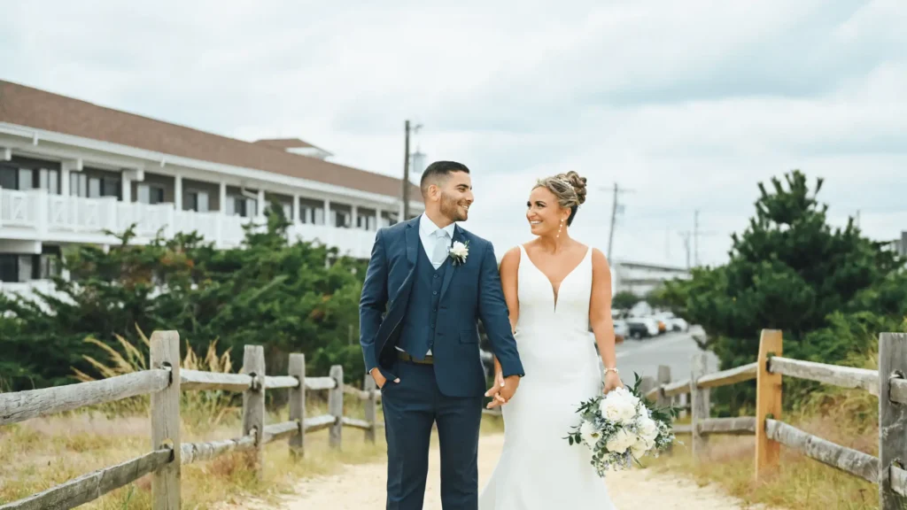 Bride and groom posing outside ICONA Avalon