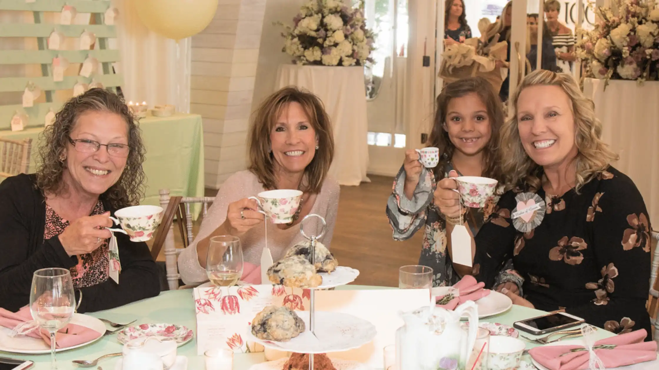 Group of women posing together at a bridal shower